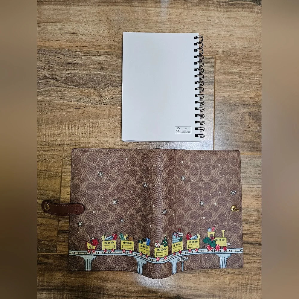 NWOT Coach Signature Canvas Notebook with Holiday Train